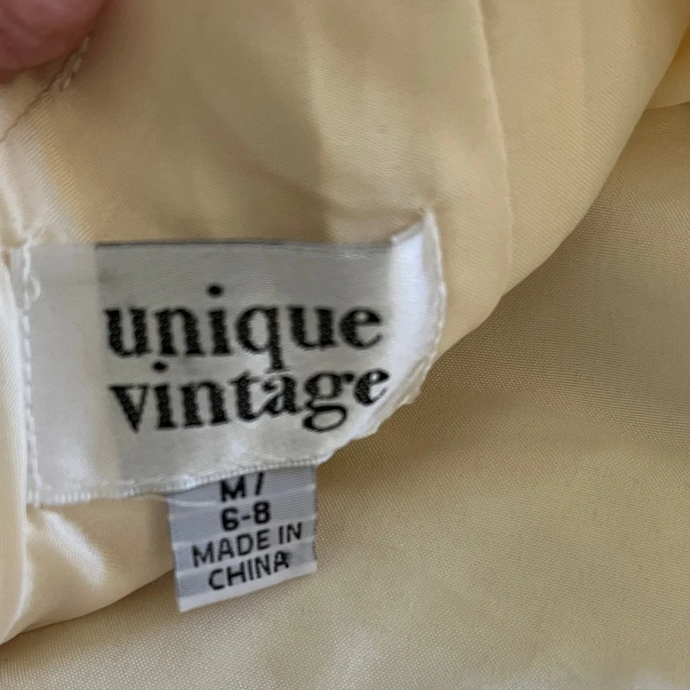 Unique Vintage Ivory Bow Detail Dress - Picture 2 of 9